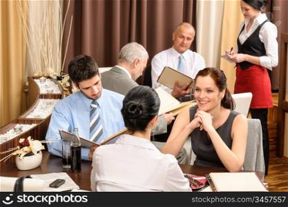 Business lunch executive people looking menu ordering meal at restaurant