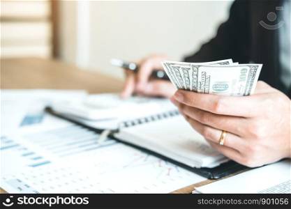 Business man Accounting Calculating Cost Economic budget investment and saving concept
