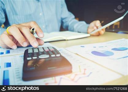 Business man Accounting Calculating Cost Economic concept