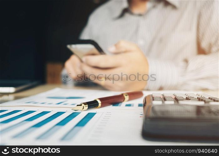 Business man Accounting Calculating Cost Economic concept in office home
