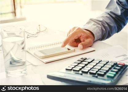 Business man Accounting Calculating Cost Economic in office