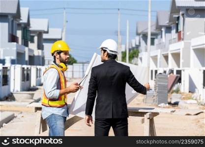 Business man and engineer meeting for project and blueprint in working site,Construction project concept.