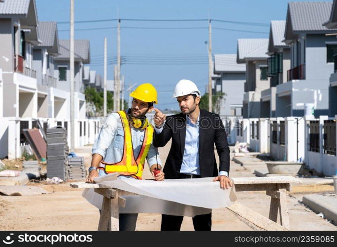 Business man and engineer meeting for project and blueprint in working site,Construction project concept.