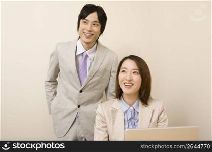 Business man and woman smiling