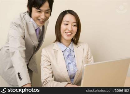 Business man and woman smiling
