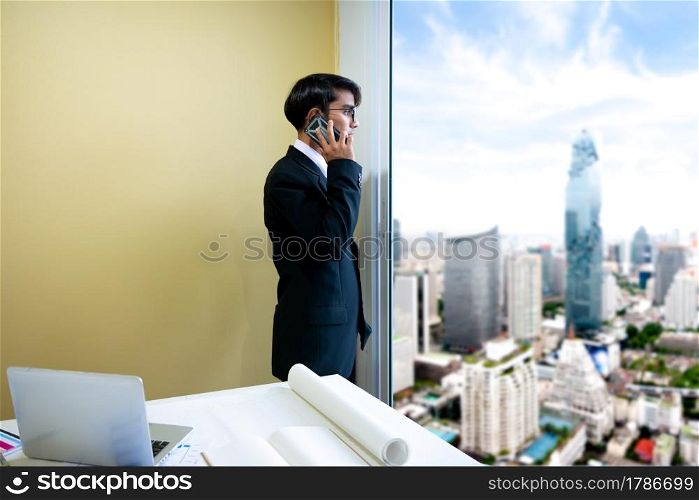 Business man are calling customers. in his office