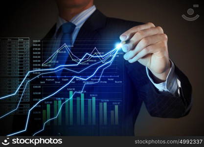 Business man drawing graphics. Closeup image of businessman drawing 3d graphics