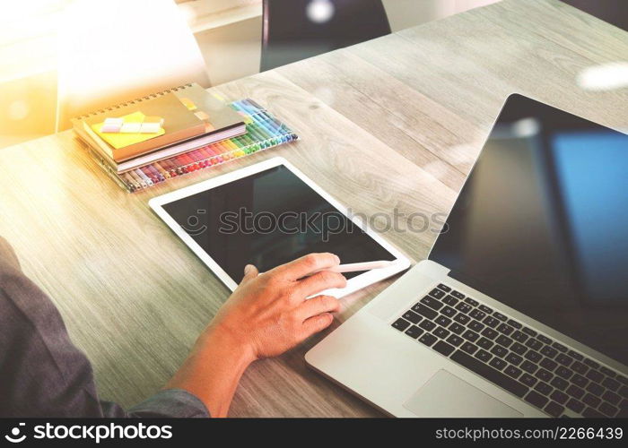  business man hand working on blank screen laptop computer and digital tablet and smart phone  on wooden desk as concept