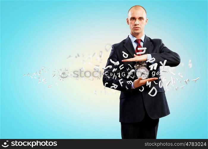 Business man holding alarmclock. Image of businessman holding alarmclock against illustration background. Collage