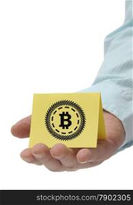 Business man holding yellow bitcoin sign on hand