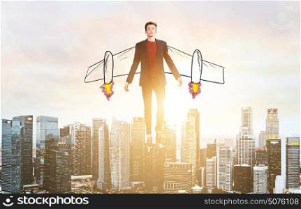 Business man hover over city skyline. Business Advantage. Businessman with sketch wings hovering over down town on sunset.