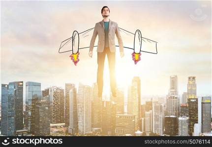 Business man hover over city skyline. Business Advantage. Businessman with sketch wings hovering over down town on sunset.