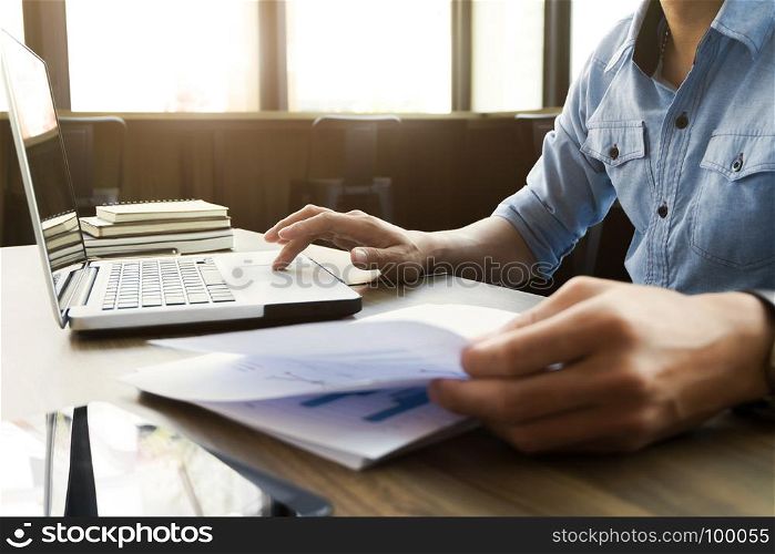 business man in casual wear working with data documents