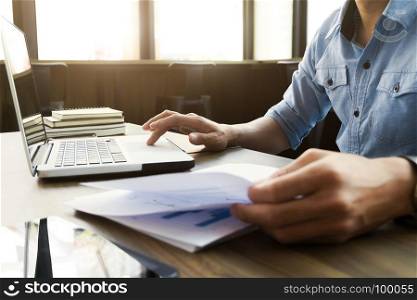 business man in casual wear working with data documents