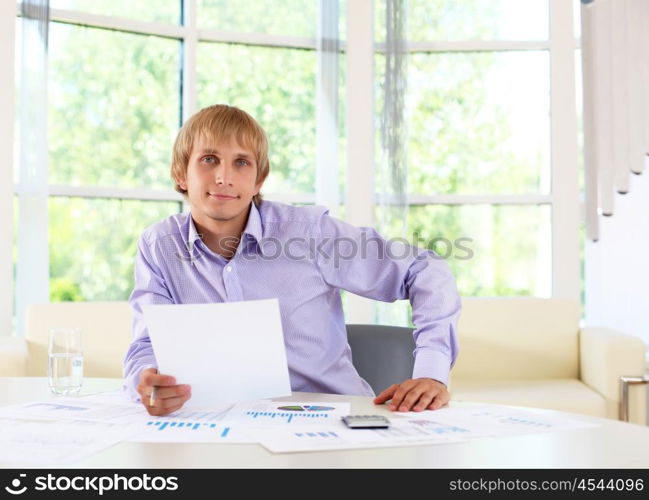 business man in office working with papers