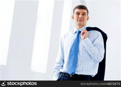 Business man in suit smiling. Image of handsome businessman smiling wearing business suit