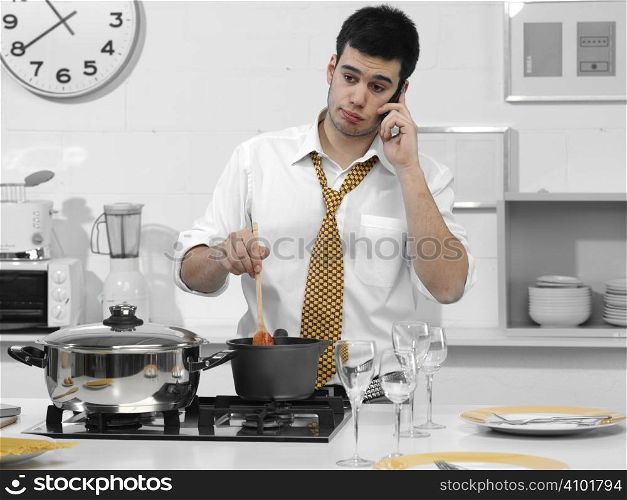business man in the kitchen talking on the phone