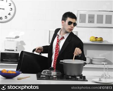 business man in the kitchen that controls the food before you leave
