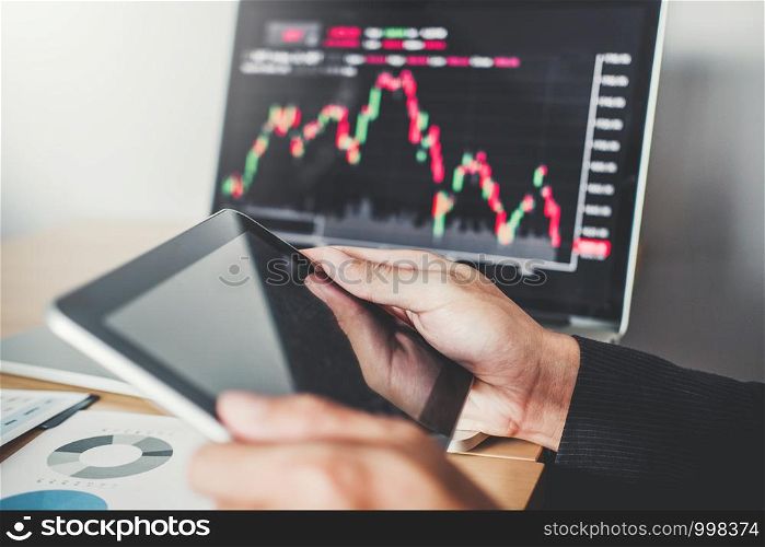 Business man Investment Entrepreneur Trading discussing and analysis graph stock market trading,stock chart concept