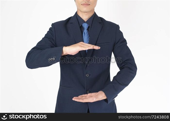 Business man is holding something on white background
