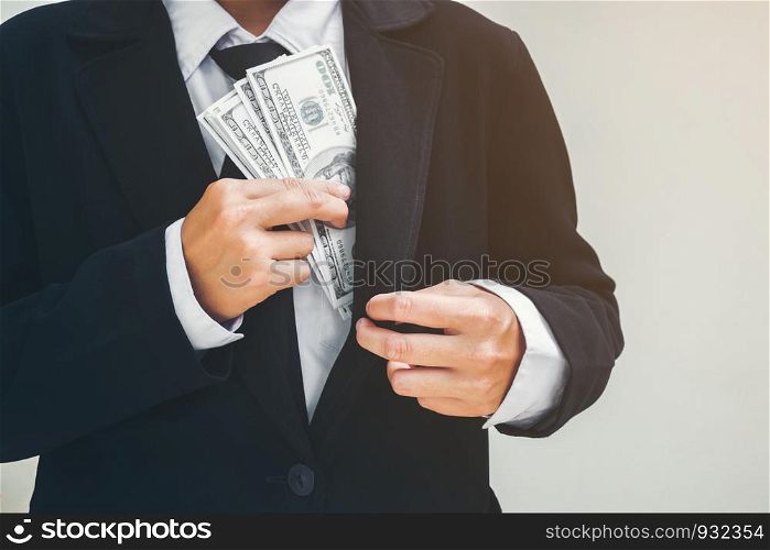 Business man keeping money Dollar bills. Saving concept