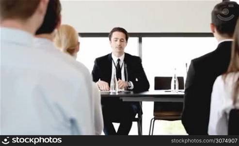 Business man making presentation in office