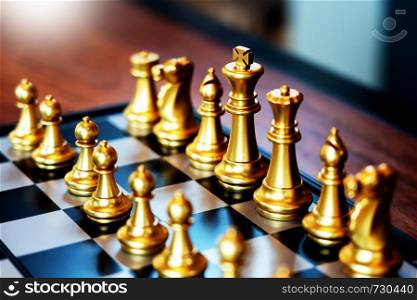 Business man moving chess game for business competition and team work concept.