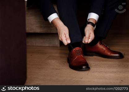 Business man or groom wearing classic elegant shoes. Business man or groom wearing classic elegant shoes.