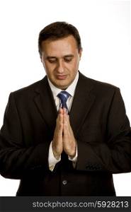 business man praying, isolated on white background