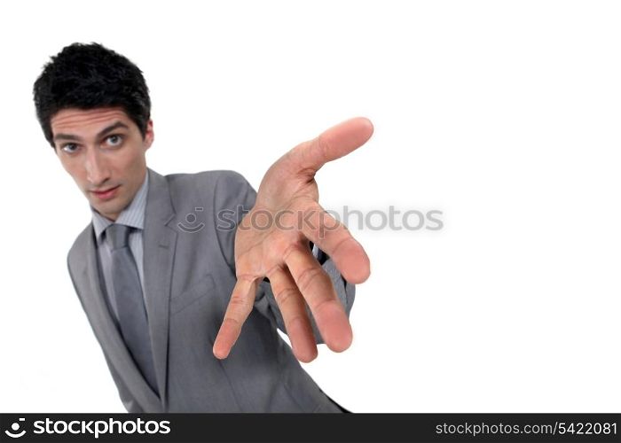 Business man presenting his hand.