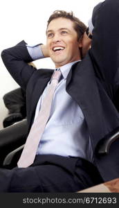 business man relaxing at his office desk