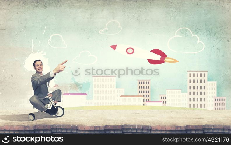 Business man riding bike. Young handsome businessman riding three wheeled bicycle