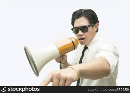 Business man screaming with a megaphone on white background