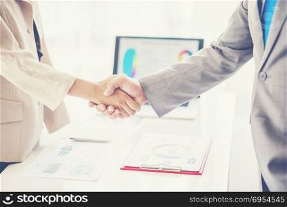 business man shaking hands during a meeting in the office, success, dealing, greeting and partner concept.