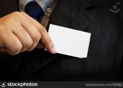 business man showing business card. Black suit and tie