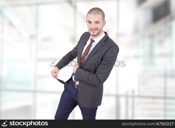 business man showing his empty pocket, at the office