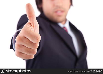 Business man showing thumb up, focus on finger