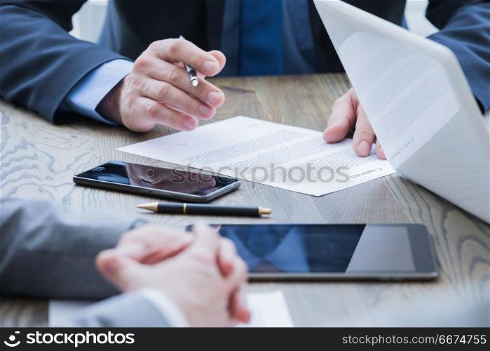 Business man sign contract. Business man sign contract on the desk at meeting