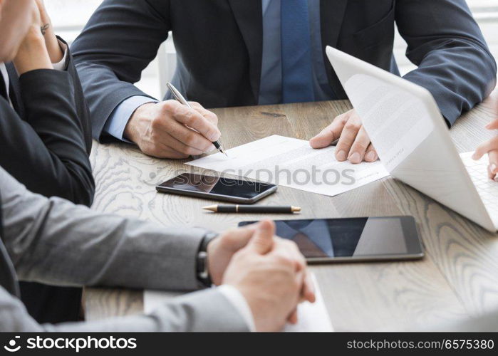 Business man sign contract on the desk at meeting. Business man sign contract