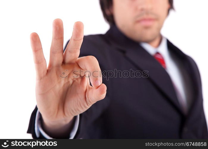 Business man signaling ok - focus on finger