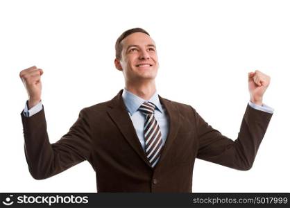Business man throwing fists in air and smiling while celebrating success isolated on white background