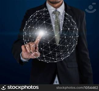 Business man touch networking technologies and social interaction on dark blue background