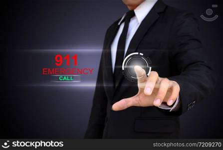 Business man touching an emergency concept on a touch screen with his finger