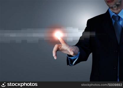 Business man touching display. Business man touching virtual display. Business and technology concept