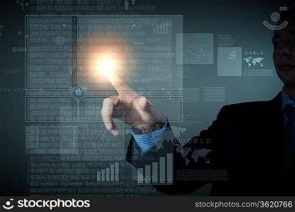 Business man touching virtual display. Business and technology concept