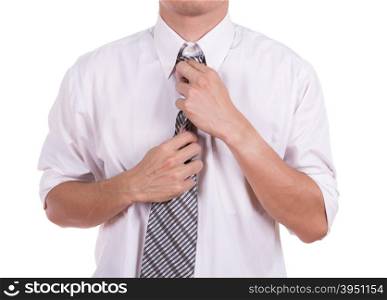 Business man tying the necktie isolated on white background