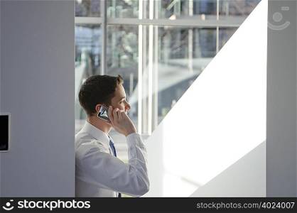 Business man using mobile in office
