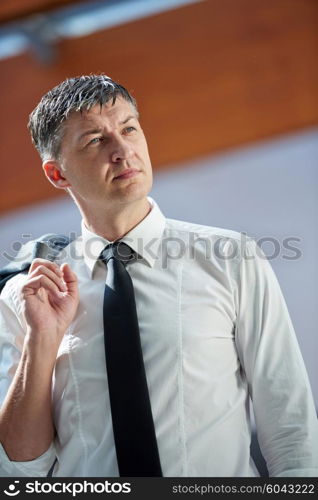 business man using phone at modern office space