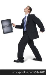 Business Man Walking With Briefcase. Great expression on face.