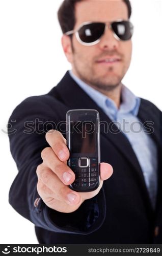 Business man wearing sunglasses and showing a Nokia mobile on a white background